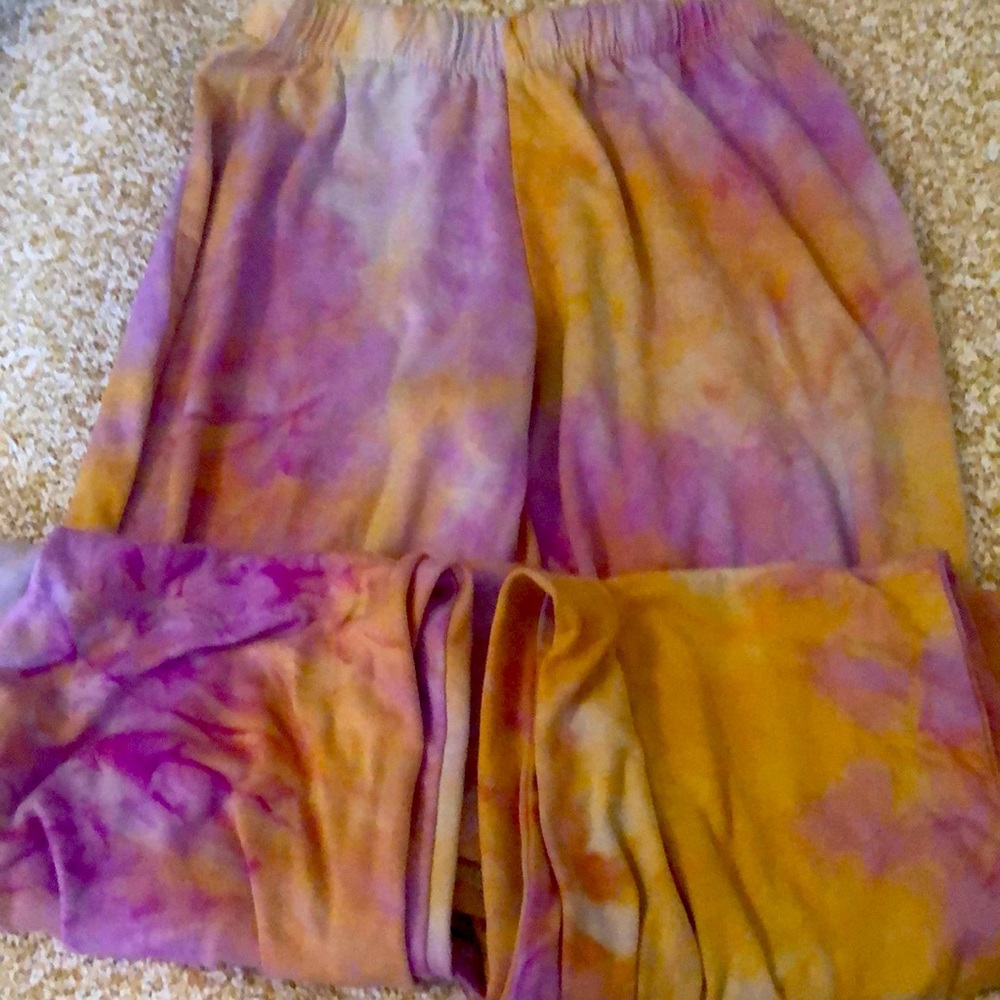 I am selling some tie dye flare out boot cut pants that are from rainbow.